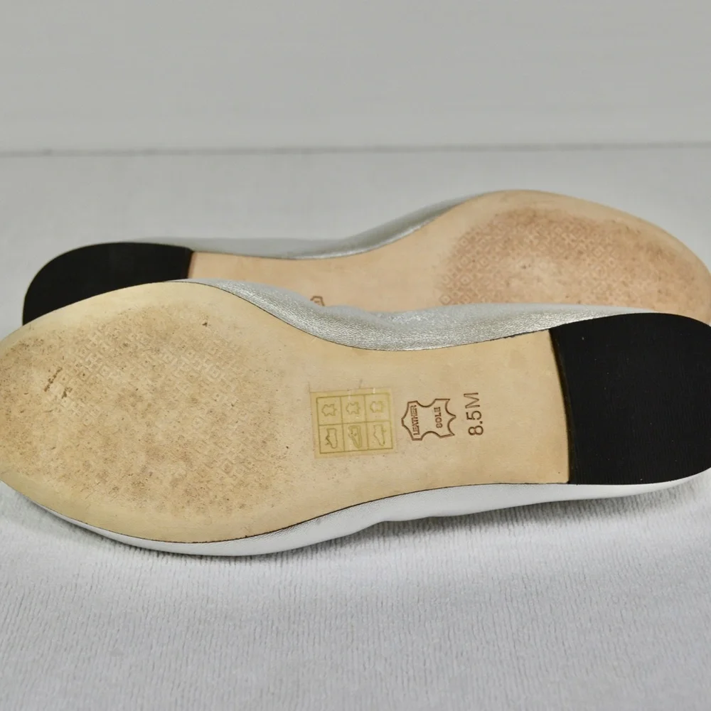 Tory Burch Women's Liana Round Toe Rhinestone Logo Metallic Leather Ball…